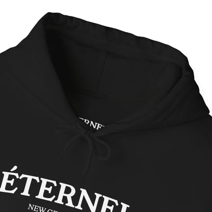 Black hoodie with 'ÉTERNEL' text on a white background